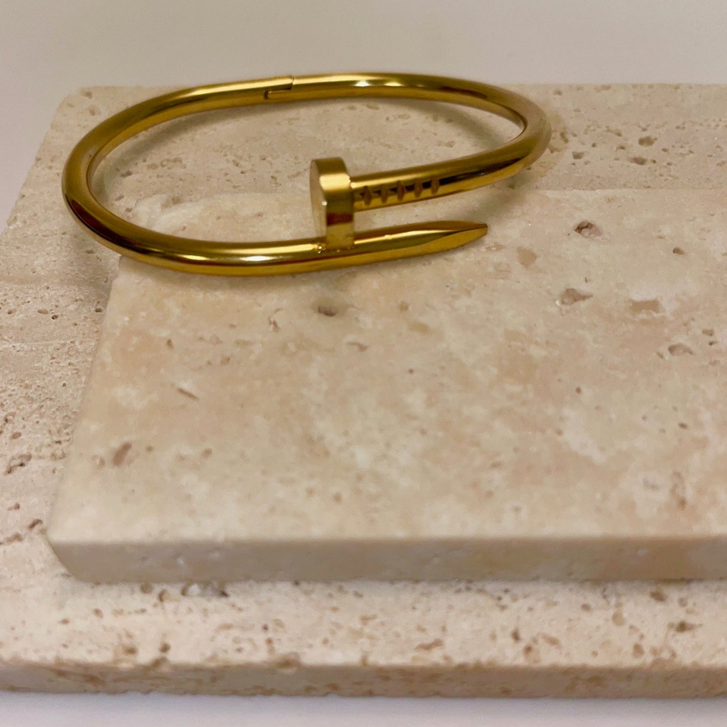 Gold nail bracelet