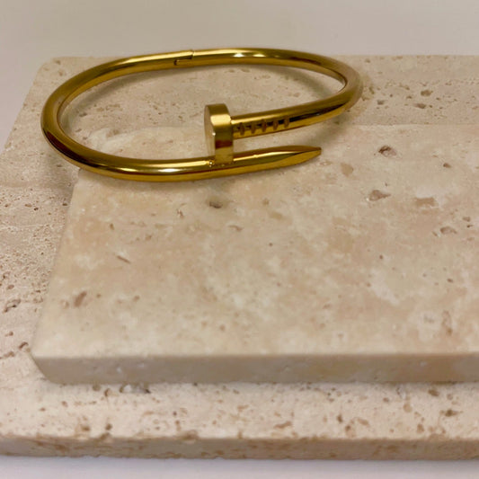 Gold nail bracelet